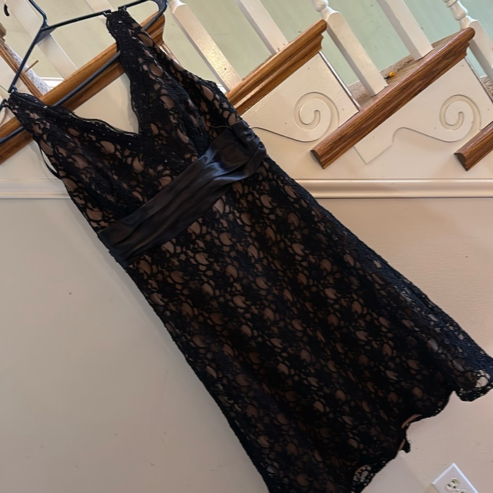 Like New gorgeous nude dress with black lace overlay with subtle sequin accents